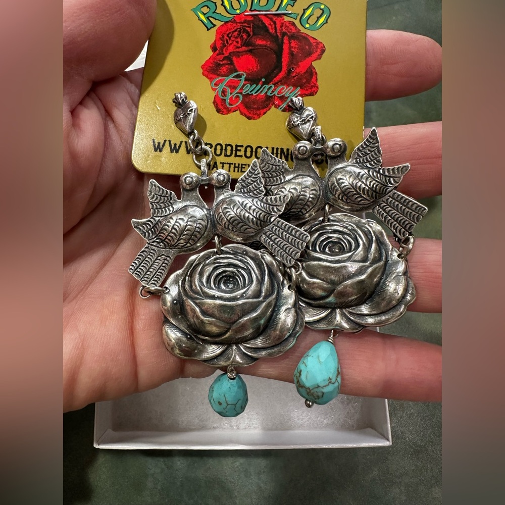 Rodeo Quincy large Spanish style earrings.
German silver w/turquoise color stone